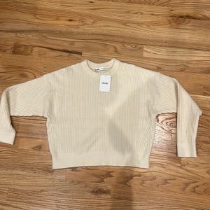 White Elodie sweater.